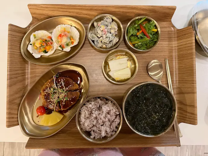 Nutritious postpartum meal with seaweed soup and protein dishes in Korea