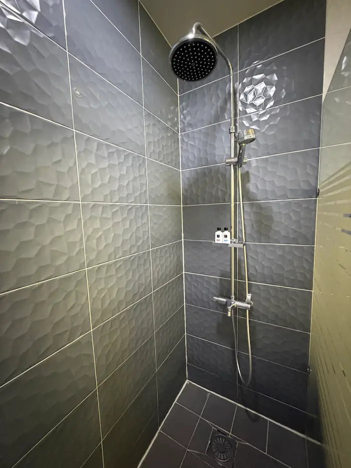 Private shower room inside a Korean Postpartum Care Center recovery suite