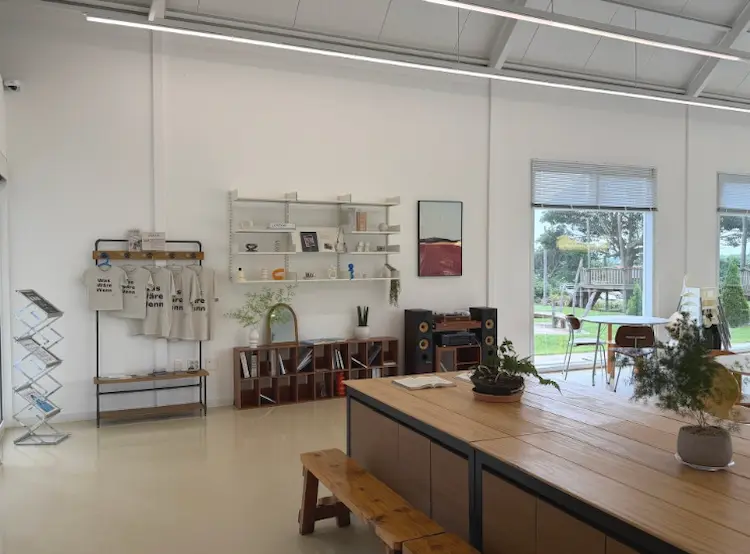 Interior display and merchandise corner at Alps Jeju Cafe