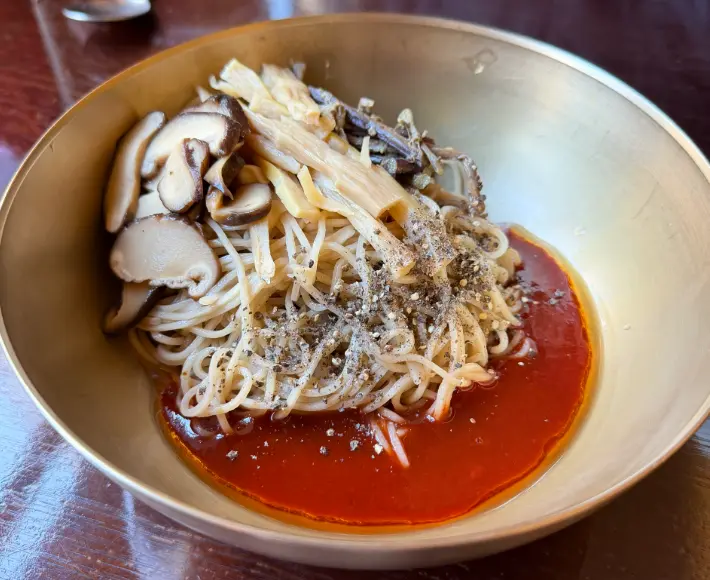 Spicy bibim noodles served at Myeon Seoul