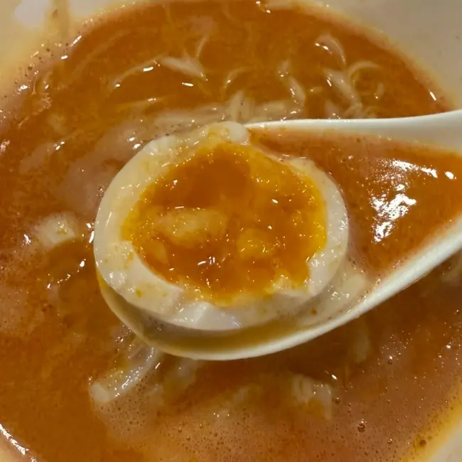 Soft-boiled egg in spicy ramen at OreNo Ramen Gangnam